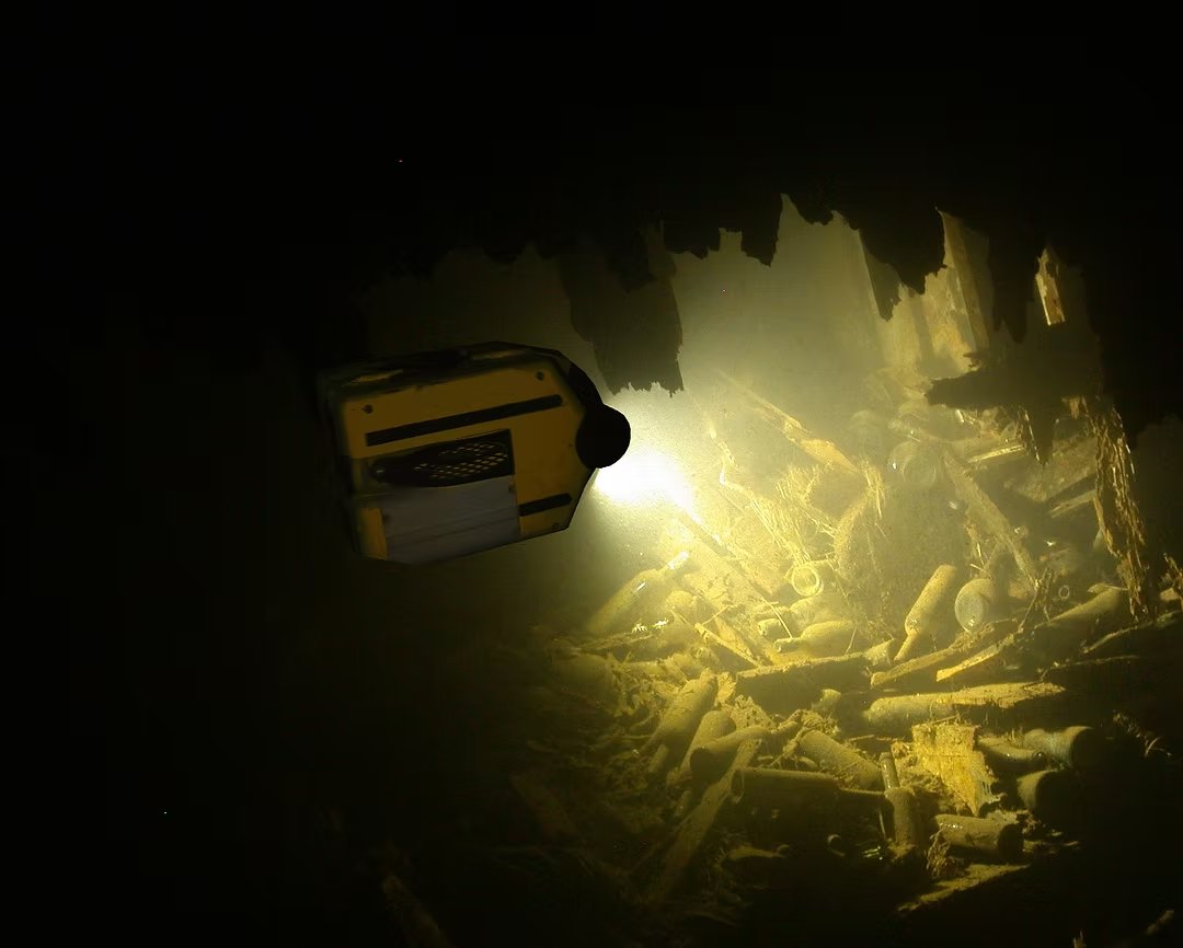ROV illuminating cargo inside the SS Gairsoppa wreck at 4,700 metres